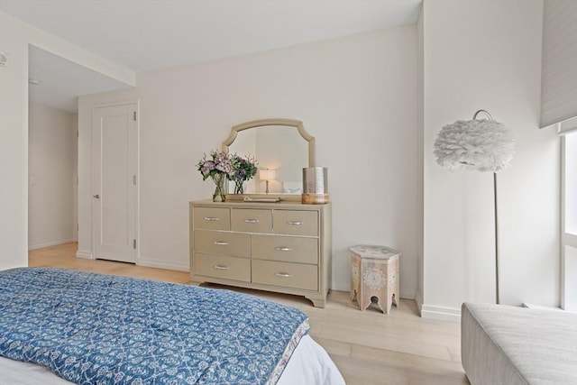 1 Franklin St Unit 1504, Boston, MA 02110 - bedroom with light wood-type flooring and baseboards