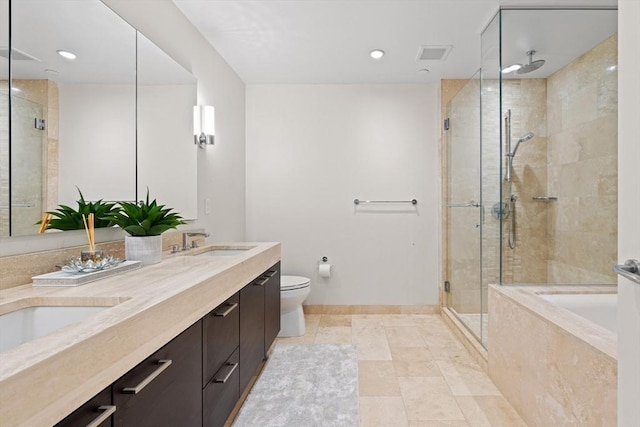 1 Franklin St Unit 1504, Boston, MA 02110 - bathroom featuring a shower stall, a garden tub, double vanity, baseboards, and toilet