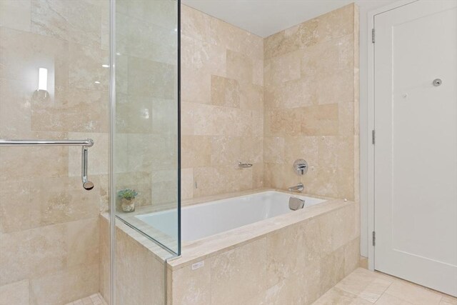 1 Franklin St Unit 1504, Boston, MA 02110 - full bathroom with a bath, tiled shower, and tile patterned flooring