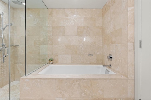 1 Franklin St Unit 1504, Boston, MA 02110 - full bathroom with a garden tub, tiled shower, and tile walls