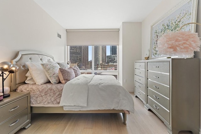 1 Franklin St Unit 1504, Boston, MA 02110 - bedroom featuring light wood finished floors