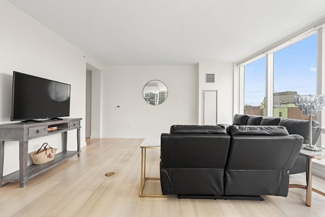 1 Franklin St Unit 1504, Boston, MA 02110 - living area featuring light wood finished floors