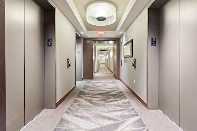 1 Franklin St Unit 1504, Boston, MA 02110 - corridor with elevator, light colored carpet, and a tray ceiling