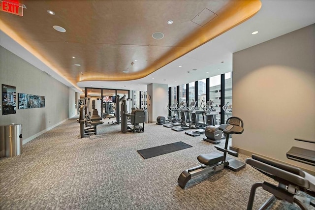 1 Franklin St Unit 1504, Boston, MA 02110 - gym featuring carpet floors, recessed lighting, floor to ceiling windows, baseboards, and a tray ceiling