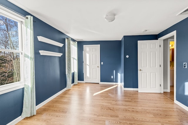 foyer entrance featuring light hardwood / wood-style flooring