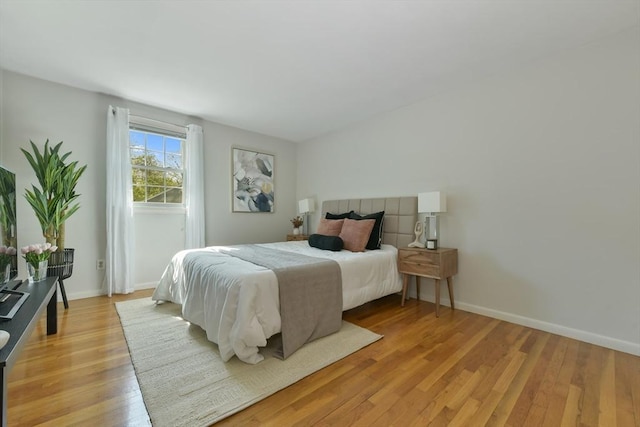 8 Edwards Rd Unit 8A, Woburn, MA 01801 - bedroom with light wood-style floors and baseboards