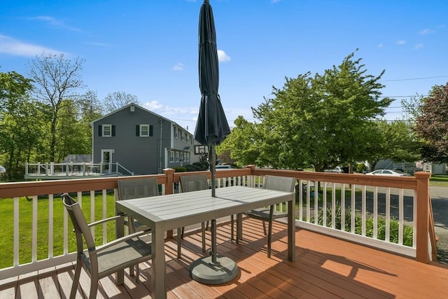 8 Edwards Rd Unit 8A, Woburn, MA 01801 - wooden terrace with outdoor dining space and a lawn