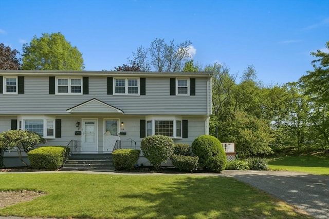 8 Edwards Rd Unit 8A, Woburn, MA 01801 - colonial home featuring a front lawn