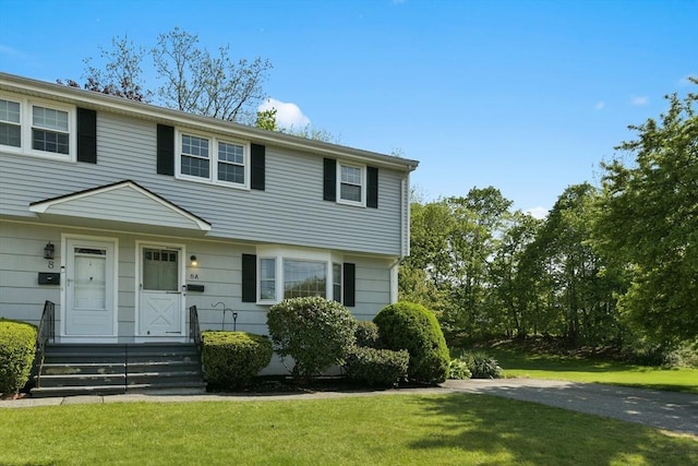 8 Edwards Rd Unit 8A, Woburn, MA 01801 - colonial home with a front yard