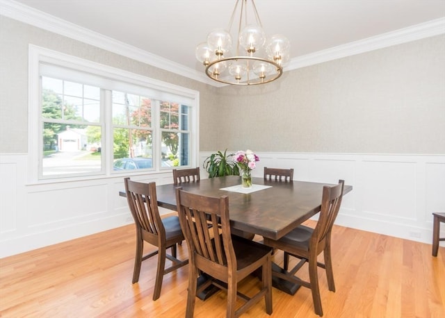 17 Elinor Cir, Waltham, MA 02452 - dining space with a chandelier, light wood-type flooring, wainscoting, ornamental molding, and a decorative wall