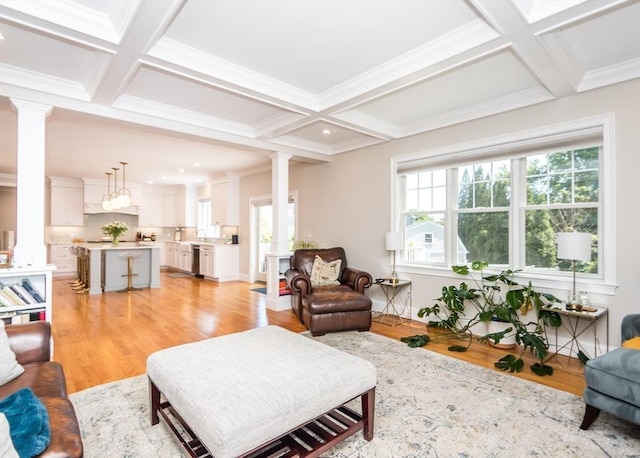 17 Elinor Cir, Waltham, MA 02452 - living room featuring decorative columns, coffered ceiling, light wood-type flooring, beam ceiling, and crown molding