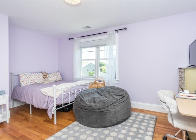 17 Elinor Cir, Waltham, MA 02452 - bedroom with light wood-style flooring and baseboards