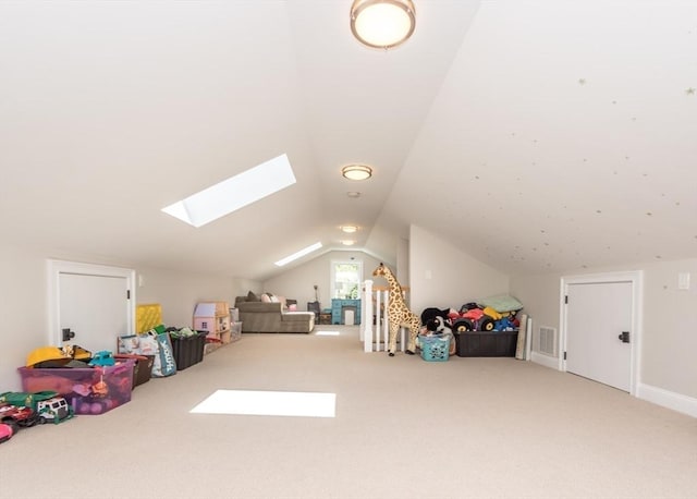 17 Elinor Cir, Waltham, MA 02452 - recreation room featuring vaulted ceiling, carpet, and a skylight