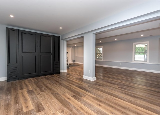 17 Elinor Cir, Waltham, MA 02452 - unfurnished living room featuring wood finished floors, baseboards, and recessed lighting