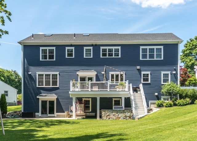 17 Elinor Cir, Waltham, MA 02452 - back of property with a yard, a deck, stairs, and a patio area