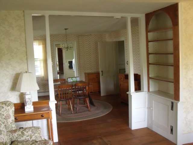 2 N St, Williamsburg, MA 01096 - dining room with wallpapered walls, wood finished floors, a chandelier, and a baseboard radiator