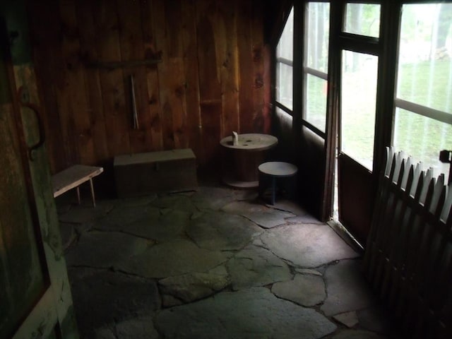 2 N St, Williamsburg, MA 01096 - bathroom featuring stone floors and wooden walls