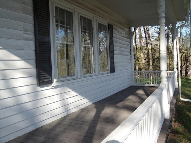 2 N St, Williamsburg, MA 01096 - wooden terrace with a porch