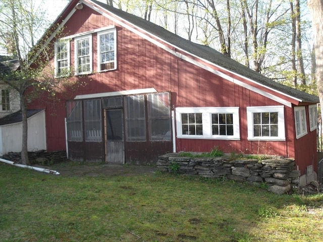 2 N St, Williamsburg, MA 01096 - view of home's exterior featuring a sunroom and a yard