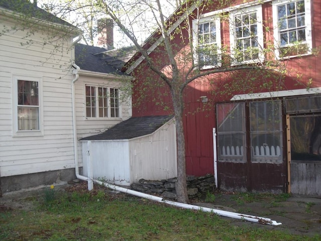 2 N St, Williamsburg, MA 01096 - view of side of property featuring a shingled roof