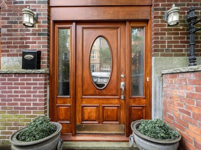 115 Sewall Ave Unit 1, Brookline, MA 02446 - view of exterior entry with brick siding