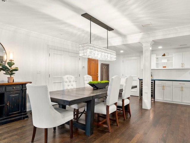 115 Sewall Ave Unit 1, Brookline, MA 02446 - dining space with ornate columns, crown molding, dark wood finished floors, recessed lighting, and wine cooler