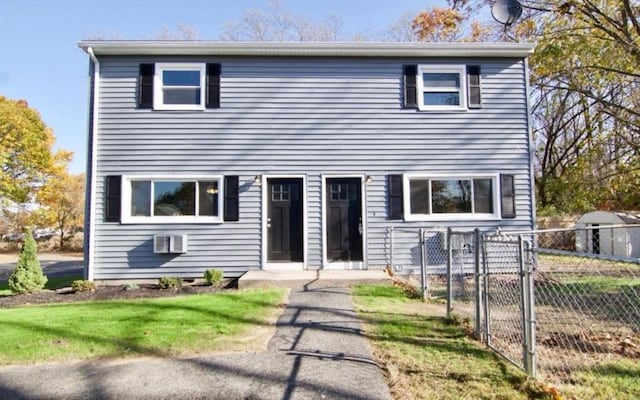 47 Van Buren Ave, Springfield, MA 01104 - traditional-style home featuring a gate and a wall mounted AC