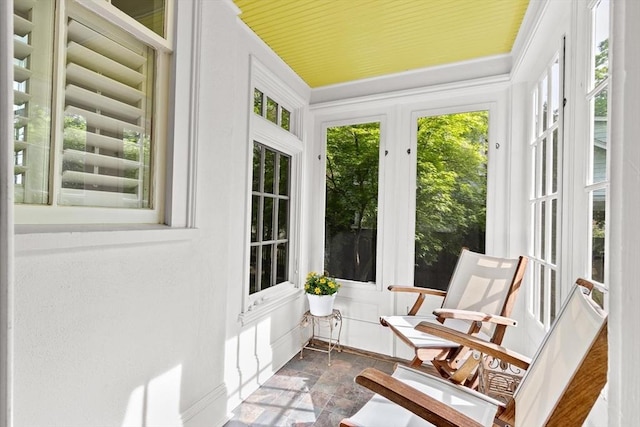 26 Saxon Rd, Newton, MA 02461 - sunroom / solarium featuring stone tile floors and french doors