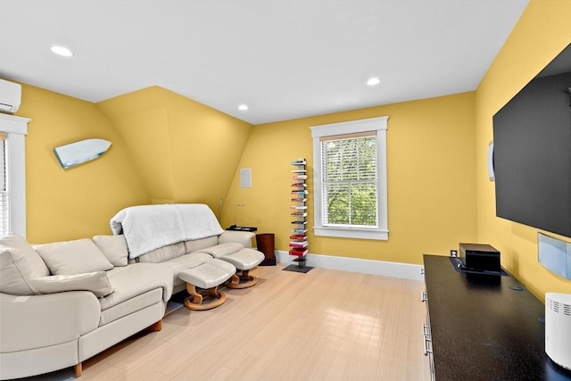 26 Saxon Rd, Newton, MA 02461 - living room featuring recessed lighting, wood finished floors, baseboards, and a wall unit AC