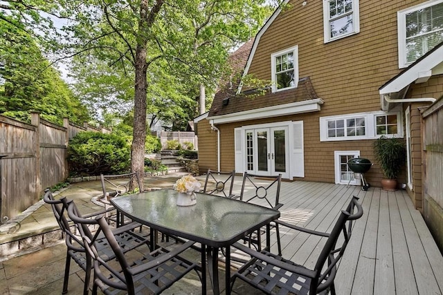 26 Saxon Rd, Newton, MA 02461 - deck with french doors, outdoor dining space, and a fenced backyard