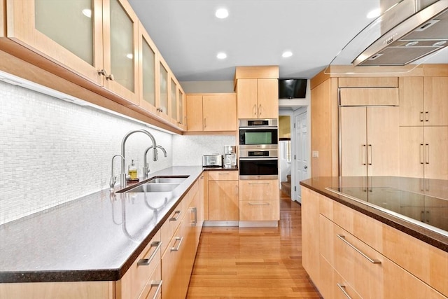 26 Saxon Rd, Newton, MA 02461 - kitchen with light brown cabinetry, a sink, ventilation hood, light wood-style flooring, and dark countertops