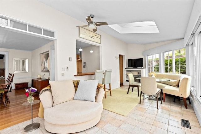 26 Saxon Rd, Newton, MA 02461 - living room featuring a skylight and a ceiling fan