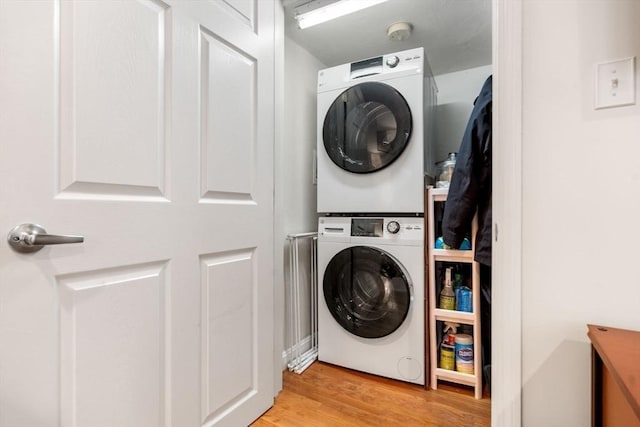 10 Peters Unit 2, Boston, MA 02127 - laundry room with estacked washer and dryer and light wood-style floors