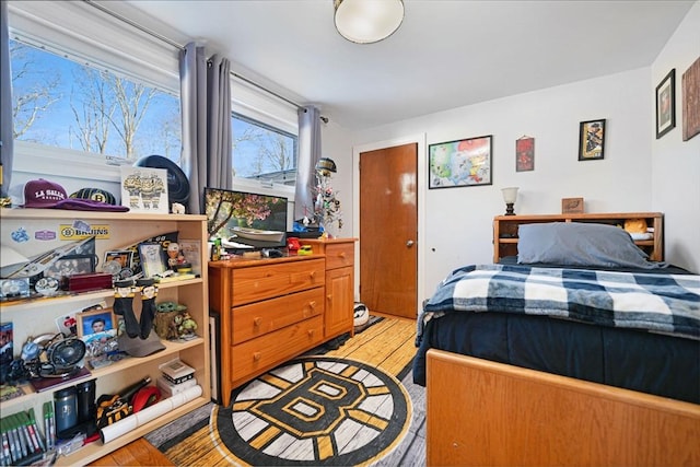 bedroom featuring light hardwood / wood-style floors