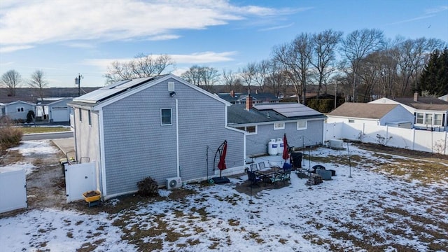 view of snow covered property