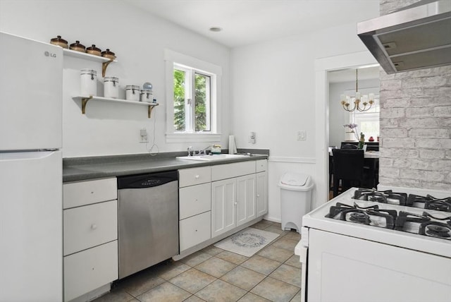 139 Washington St, Hudson, MA 01749 - kitchen featuring white appliances, exhaust hood, white cabinets, a chandelier, and a sink