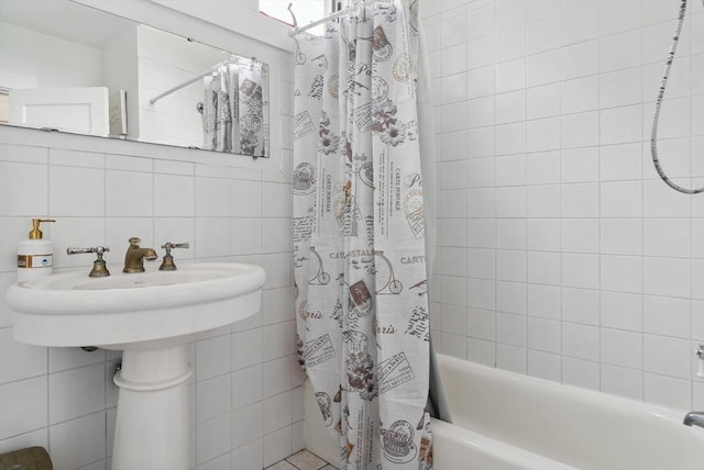 139 Washington St, Hudson, MA 01749 - bathroom featuring tile walls and shower / bath combination with curtain