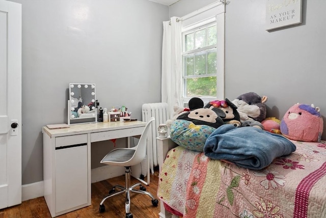 139 Washington St, Hudson, MA 01749 - bedroom featuring wood finished floors and radiator
