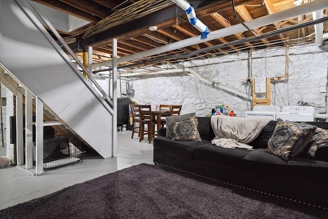 139 Washington St, Hudson, MA 01749 - unfinished basement featuring washer and dryer