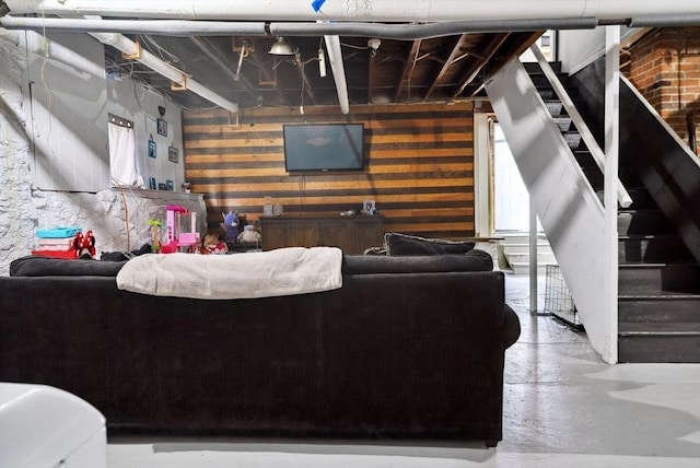 139 Washington St, Hudson, MA 01749 - living area featuring concrete floors and stairs