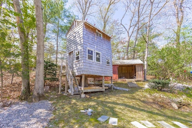rear view of house with stairs