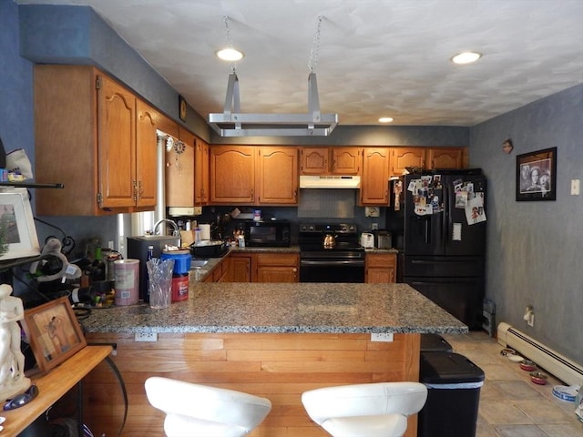 13 Lark St, New Bedford, MA 02745 - kitchen featuring under cabinet range hood, a sink, brown cabinets, a peninsula, and black appliances