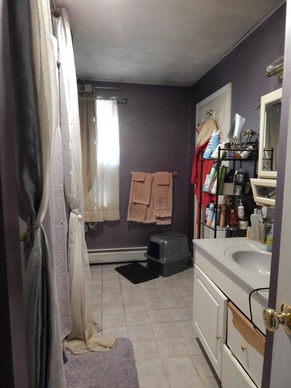 13 Lark St, New Bedford, MA 02745 - bathroom with vanity and a baseboard radiator
