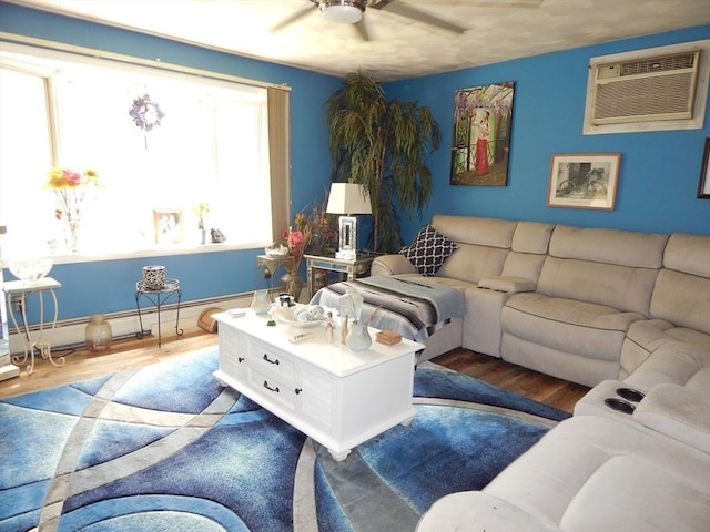 13 Lark St, New Bedford, MA 02745 - living room with a wall mounted AC, a ceiling fan, baseboard heating, and wood finished floors