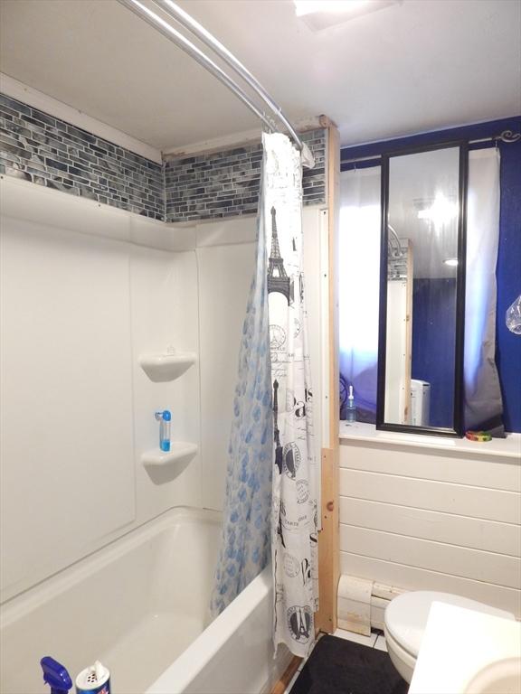 13 Lark St, New Bedford, MA 02745 - bathroom with toilet and shower / bath combo with shower curtain