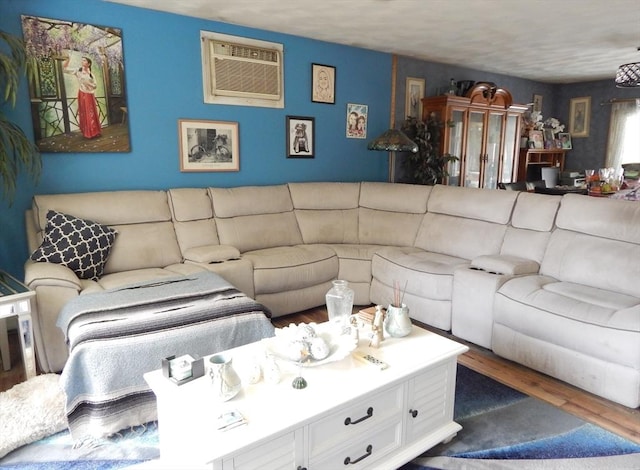 13 Lark St, New Bedford, MA 02745 - living area with a wall unit AC and wood finished floors