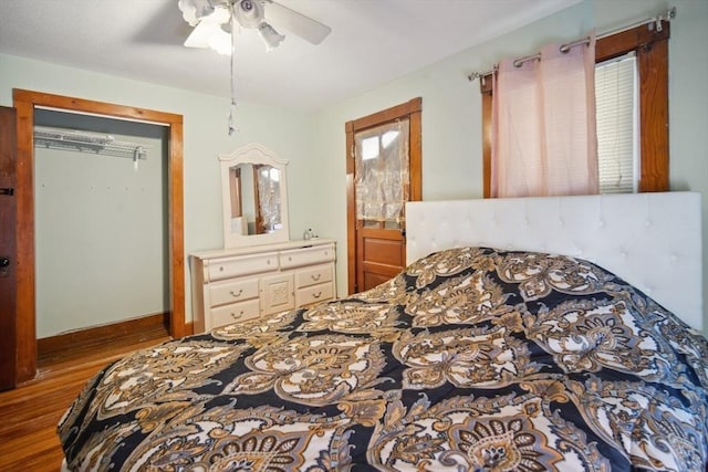 bedroom with ceiling fan and light hardwood / wood-style floors