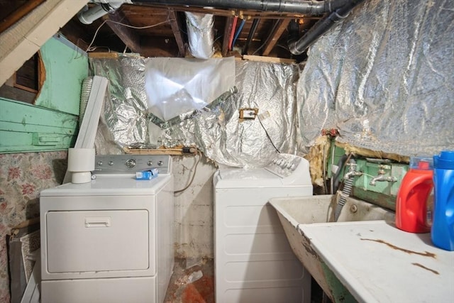 laundry room with independent washer and dryer