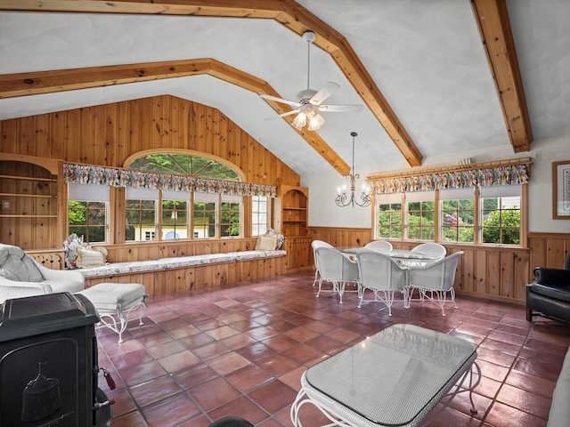 47 Skelton Rd, Burlington, MA 01803 - tiled living area with wooden walls, wainscoting, a chandelier, a ceiling fan, and beamed ceiling