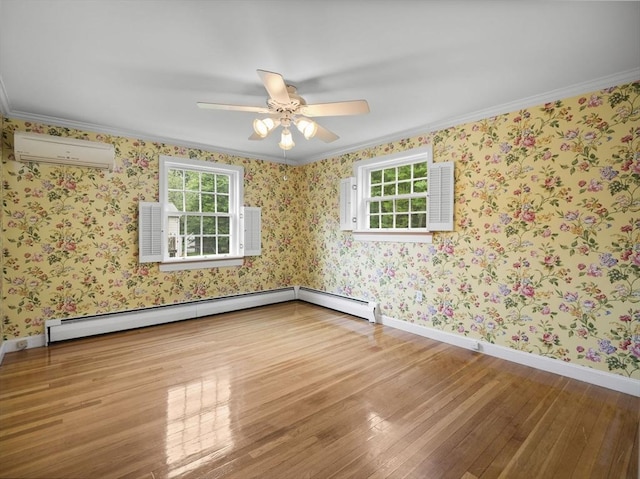 47 Skelton Rd, Burlington, MA 01803 - spare room with healthy amount of natural light, wood finished floors, a wall mounted air conditioner, ceiling fan, and ornamental molding